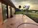Spacious patio with lake view, offering ample outdoor space at 18875 Ashcroft Cir, Port Charlotte, FL 33948
