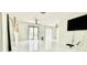 Bright living room with tile floors, large TV, and sliding glass doors at 18875 Ashcroft Cir, Port Charlotte, FL 33948