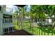 Balcony view of lush landscaping and community grounds at 2425 Flamingo Blvd # K28, Bradenton, FL 34207