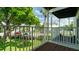 Relaxing balcony view overlooking lush landscaping and mature trees in a peaceful community at 2425 Flamingo Blvd # K28, Bradenton, FL 34207