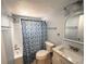 Bright bathroom featuring a bathtub with shower, marble vanity, and elegant mirror at 2425 Flamingo Blvd # K28, Bradenton, FL 34207