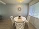 Dining area features hardwood floors, chandelier, and a decorative wall at 2425 Flamingo Blvd # K28, Bradenton, FL 34207