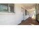Exterior facade of condo building with access to unit door at 2425 Flamingo Blvd # K28, Bradenton, FL 34207