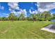 Large, well-maintained backyard offers endless possibilities for outdoor enjoyment at 3125 Pickett St, Port Charlotte, FL 33981