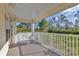 Relaxing porch swing adds a touch of comfort to this outdoor retreat at 3125 Pickett St, Port Charlotte, FL 33981