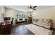 Inviting living room with cozy window seat, modern furnishings, and lots of natural light at 4175 Arrow Ln, Sarasota, FL 34232