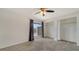 Main bedroom with carpet, ceiling fan and walk-in closet at 3339 Ramblewood Ct, Sarasota, FL 34237