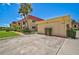 Exterior view of condo building with parking at 213 Rubens Dr # D, Nokomis, FL 34275