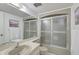 Clean bathroom with shower and tub at 213 Rubens Dr # D, Nokomis, FL 34275