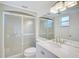 Updated bathroom with a modern vanity and a shower/tub combination at 213 Rubens Dr # D, Nokomis, FL 34275