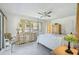 Spacious main bedroom with a comfortable bed and plenty of closet space at 213 Rubens Dr # D, Nokomis, FL 34275
