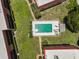 Aerial view of community pool with surrounding landscaping at 213 Rubens Dr # D, Nokomis, FL 34275