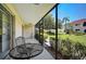 Relaxing screened porch overlooking garden at 213 Rubens Dr # D, Nokomis, FL 34275