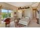 Guest room with a Murphy bed and built-in shelves at 2151 Gulf Of Mexico Dr # 5, Longboat Key, FL 34228