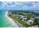 Expansive aerial view of beachfront community at 2151 Gulf Of Mexico Dr # 5, Longboat Key, FL 34228