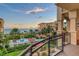 Oceanfront balcony overlooking pool and landscaping at 2151 Gulf Of Mexico Dr # 5, Longboat Key, FL 34228