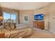 Luxurious bedroom with ocean views and large TV at 2151 Gulf Of Mexico Dr # 5, Longboat Key, FL 34228