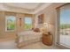Spacious bedroom with large windows, balcony access, and plenty of natural light at 2151 Gulf Of Mexico Dr # 5, Longboat Key, FL 34228
