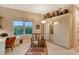 Bright home office features built-in cabinets and a view at 2151 Gulf Of Mexico Dr # 5, Longboat Key, FL 34228