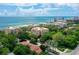 Luxury beachfront condo community aerial view, showcasing its buildings and landscape at 2151 Gulf Of Mexico Dr # 5, Longboat Key, FL 34228