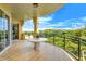 Spacious balcony with tiled flooring and ocean views at 2151 Gulf Of Mexico Dr # 5, Longboat Key, FL 34228