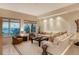 Living room with ocean view and comfortable seating at 2151 Gulf Of Mexico Dr # 5, Longboat Key, FL 34228