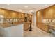 Gourmet kitchen with granite counters and wood cabinets at 2151 Gulf Of Mexico Dr # 5, Longboat Key, FL 34228
