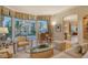Relaxing living room with hardwood floors, comfortable seating, and water views at 2151 Gulf Of Mexico Dr # 5, Longboat Key, FL 34228
