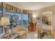 Ocean view dining area with seating for four and access to a balcony at 2151 Gulf Of Mexico Dr # 5, Longboat Key, FL 34228