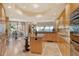 Open concept kitchen with island and ocean views at 2151 Gulf Of Mexico Dr # 5, Longboat Key, FL 34228