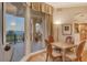 Small dining area with ocean views and wooden chairs at 2151 Gulf Of Mexico Dr # 5, Longboat Key, FL 34228