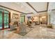 Spacious lobby with seating area and fireplace at 2151 Gulf Of Mexico Dr # 5, Longboat Key, FL 34228