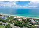 Aerial view of condo building near beach, highlighting its location and oceanfront proximity at 2151 Gulf Of Mexico Dr # 5, Longboat Key, FL 34228