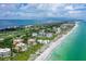 Aerial view showcasing beachfront location and luxurious building at 2151 Gulf Of Mexico Dr # 5, Longboat Key, FL 34228