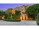 Elegant condo entrance with lush landscaping at 2151 Gulf Of Mexico Dr # 5, Longboat Key, FL 34228