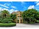 Building exterior showcasing landscaping and architectural details at 2151 Gulf Of Mexico Dr # 5, Longboat Key, FL 34228