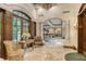 Elegant lobby with comfortable seating and fireplace at 2151 Gulf Of Mexico Dr # 5, Longboat Key, FL 34228