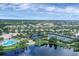 Community overview with lake, pool, and sports courts at 5901 Mariposa Ln, Sarasota, FL 34238