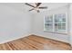 Bright bedroom with hardwood floors and a large window offering natural light at 3125 Pickett St, Port Charlotte, FL 33981