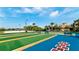 Outdoor shuffleboard and bocce ball courts near the clubhouse at 1003 Fairwaycove Ln # 205, Bradenton, FL 34212