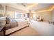 Luxurious Primary suite featuring sitting area and large windows at 1111 Ritz Carlton Dr # 1802, Sarasota, FL 34236