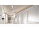 Bright walk-in closet with custom built-ins and great lighting at 1111 Ritz Carlton Dr # 1802, Sarasota, FL 34236