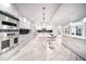 Modern kitchen with stainless steel appliances and marble countertops at 1111 Ritz Carlton Dr # 1802, Sarasota, FL 34236