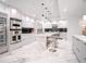 Modern kitchen with stainless steel appliances and marble counters at 1111 Ritz Carlton Dr # 1802, Sarasota, FL 34236