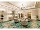 Elegant lobby with seating area and chandelier at 1111 Ritz Carlton Dr # 1802, Sarasota, FL 34236