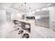 Modern kitchen with a large island and stainless steel appliances at 1111 Ritz Carlton Dr # 1802, Sarasota, FL 34236