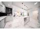 Spacious kitchen, marble floors, island, and stainless steel appliances at 1111 Ritz Carlton Dr # 1802, Sarasota, FL 34236