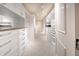Large walk-in closet with ample storage space and shelving at 1111 Ritz Carlton Dr # 1802, Sarasota, FL 34236