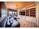 Relaxing Gathering room with a sectional sofa, built-in shelving, and a large window at 1111 Ritz Carlton Dr # 1802, Sarasota, FL 34236