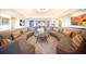 Living room with circular seating and a glass coffee table at 1111 Ritz Carlton Dr # 1802, Sarasota, FL 34236